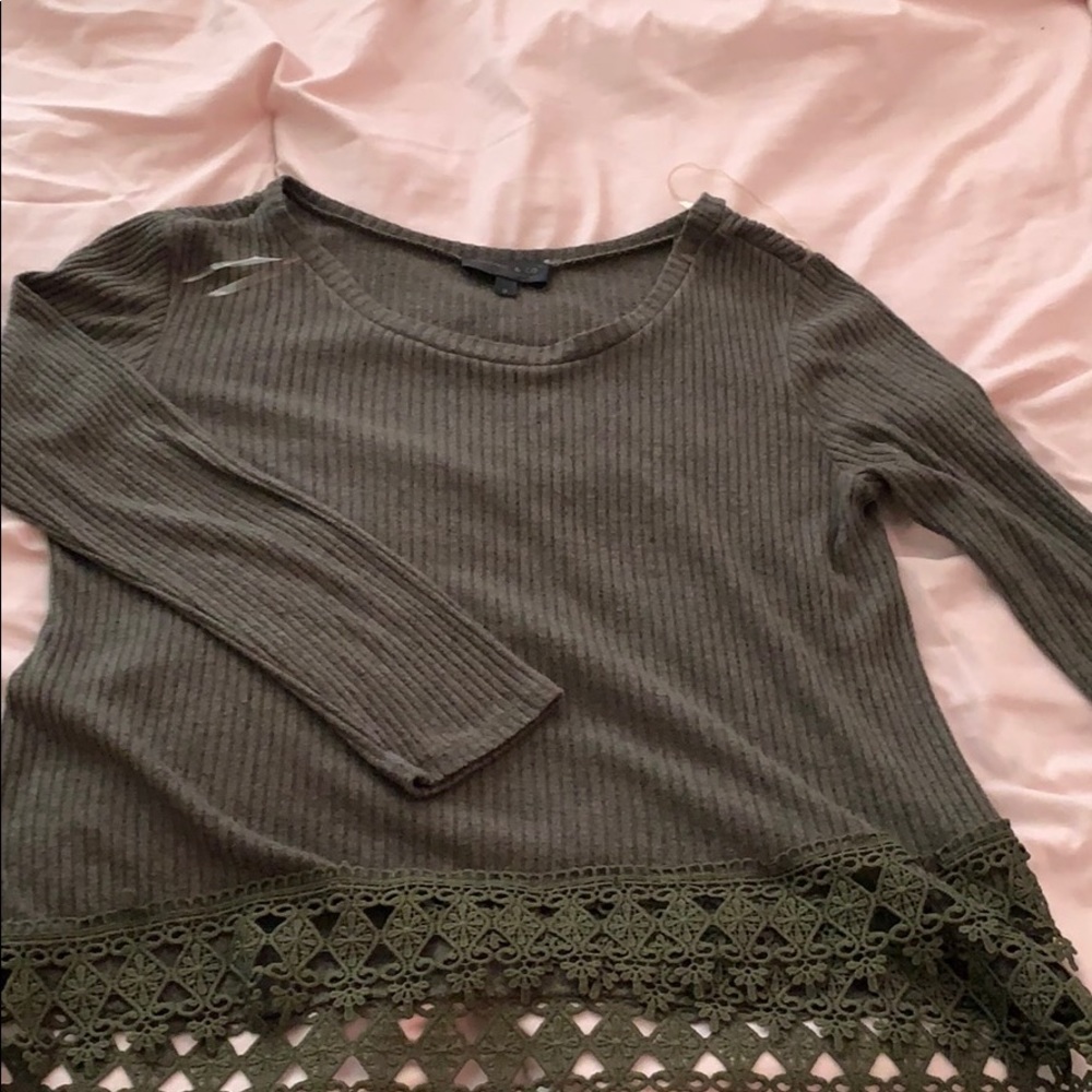 dark green long sleeve top.